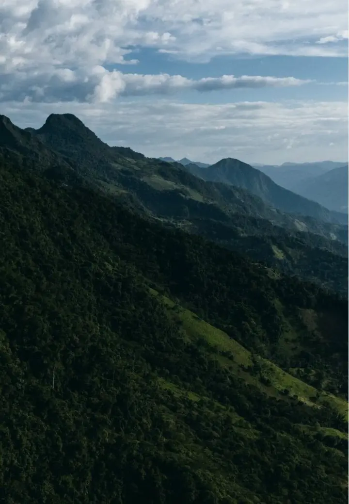 Steep mountains near Chivor under a bright sky